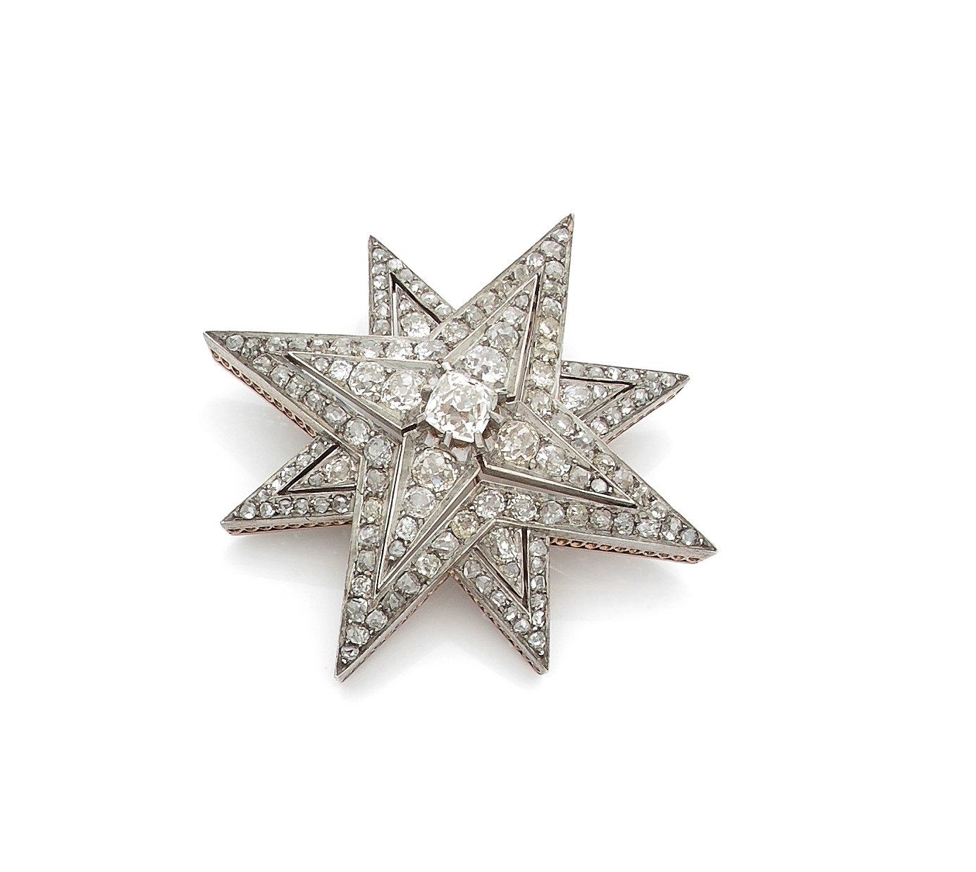Null Broche en argent et en or 18K (750) en forme d’étoile, sertie de diamants d&hellip;