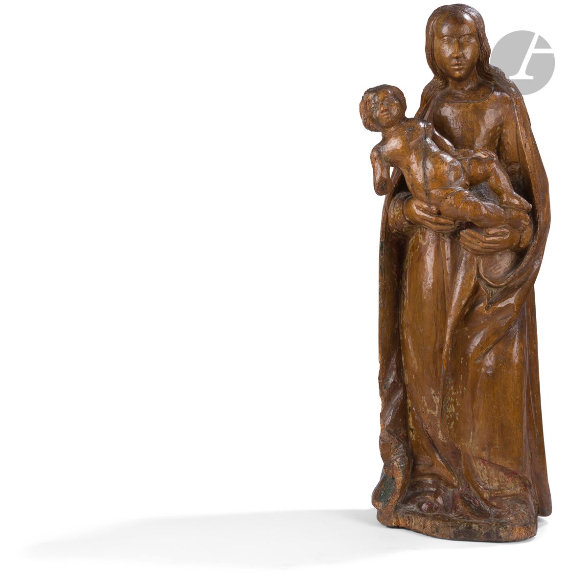 Null 圆雕的胡桃木圣母和圣婴，带有多色性的遗迹。
16世纪初
高：82.5厘米
 （可见缺失部分，包括儿童的右臂，裂缝和填充物）。