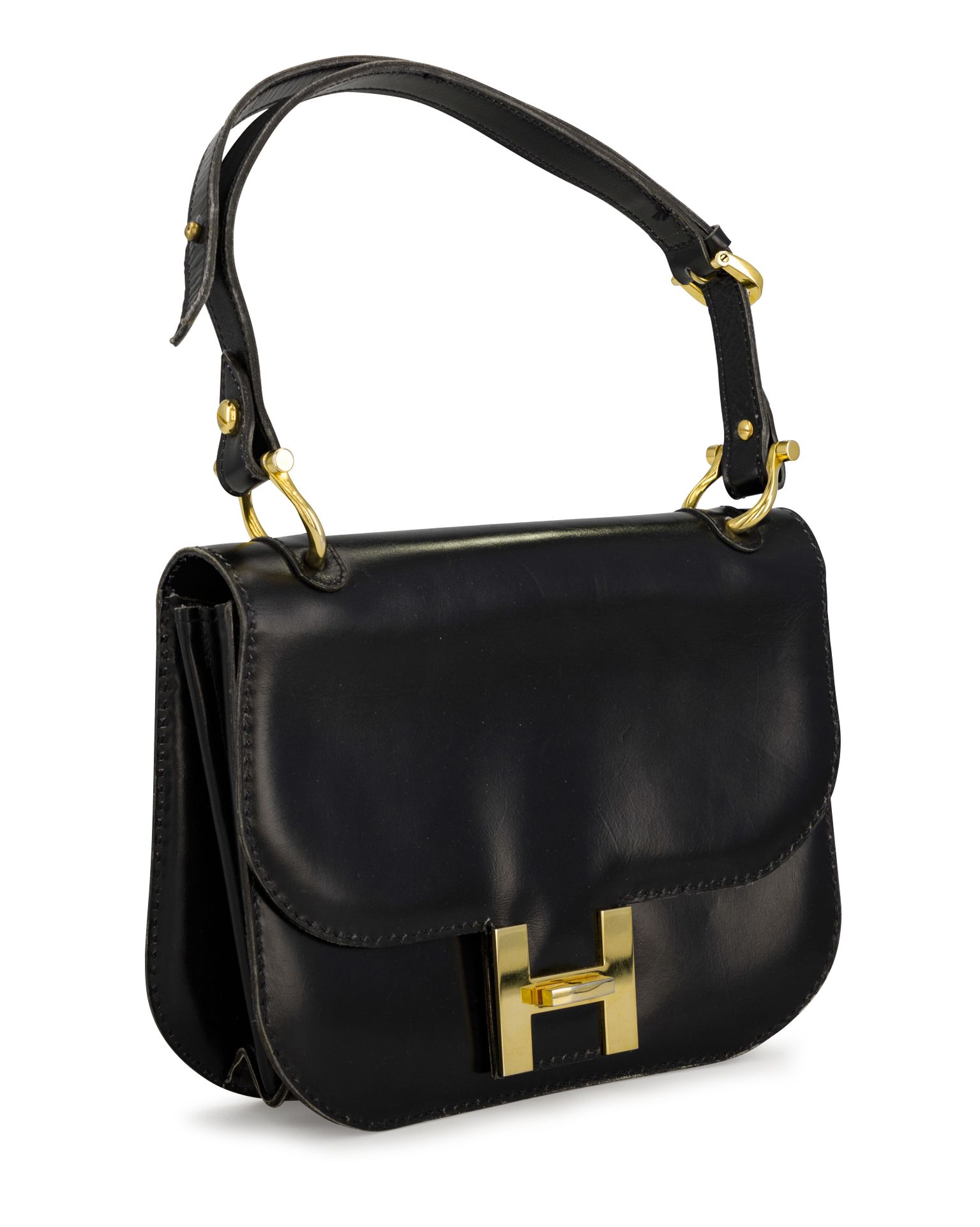 Null Anonymous. Black leather and gold metal bag. Dimensions: 27 x 19 x 6 cm