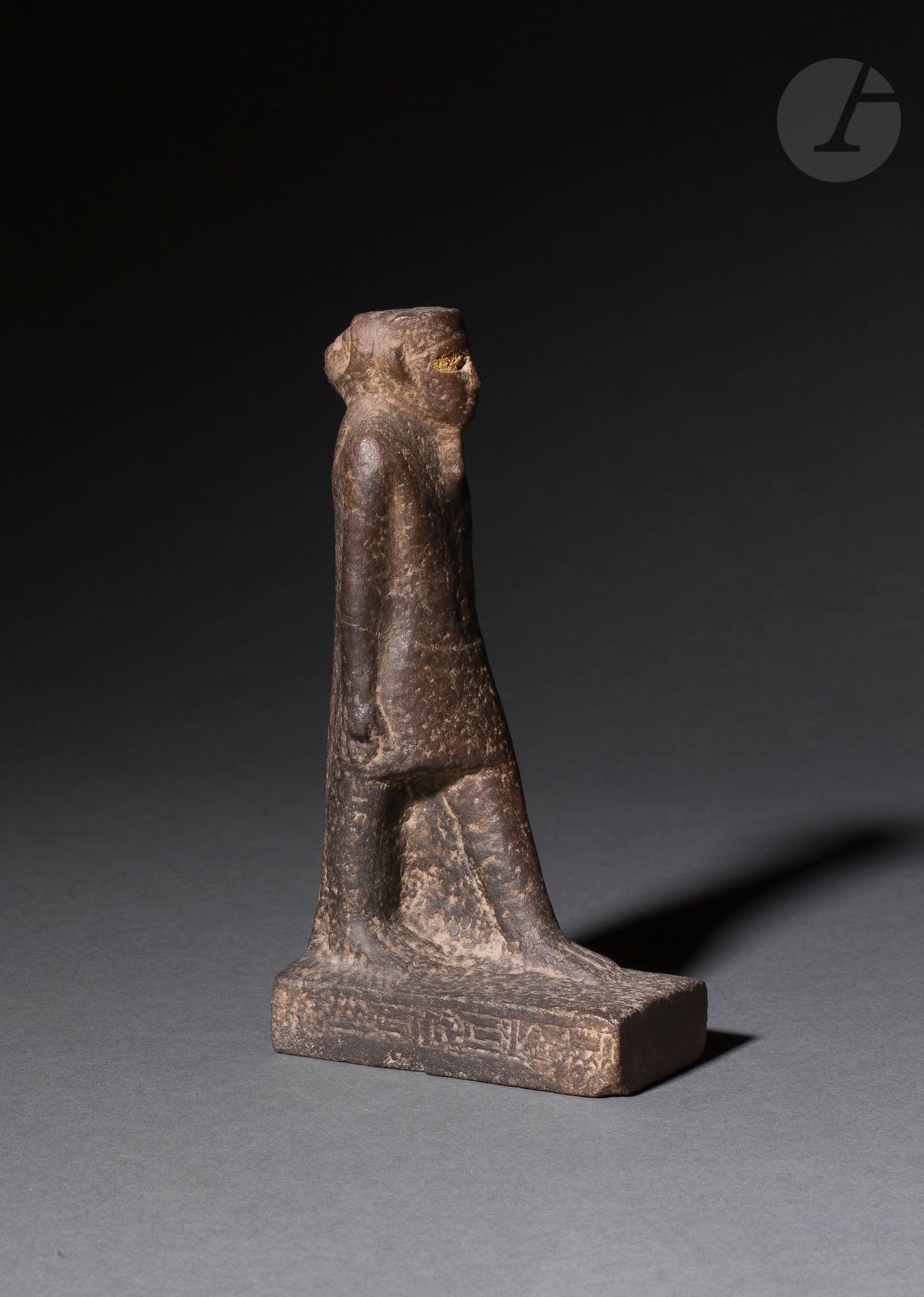 Null Statue representing on one side a god Amun walking, and on the other a Khnu&hellip;