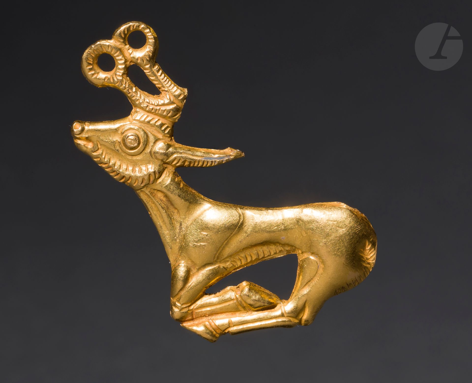 Null Ornament depicting a stag at full gallop, legs folded under the body
The an&hellip;