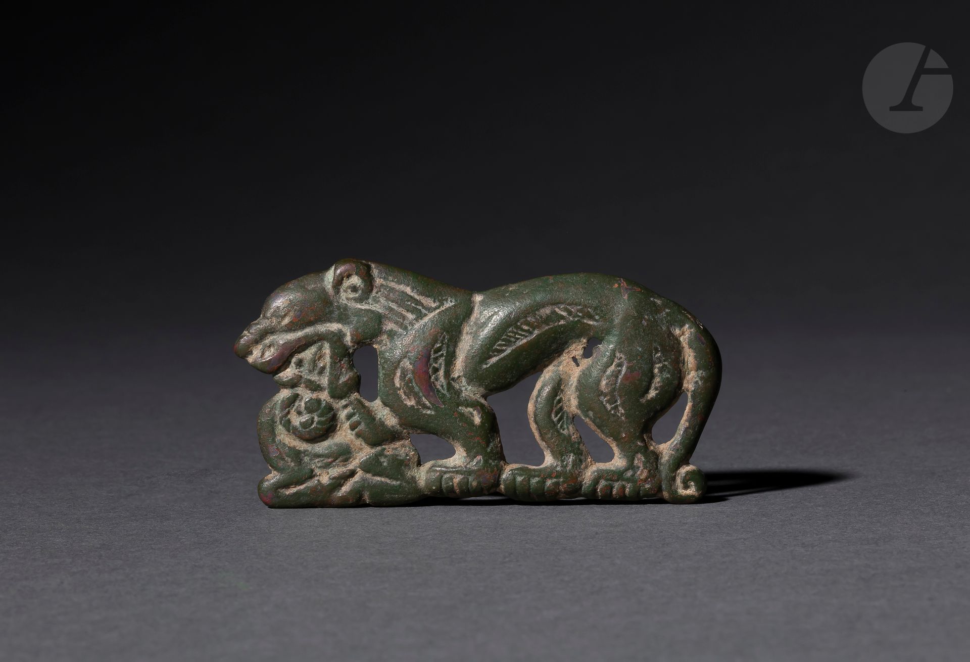 Null Plate showing a panther attacking a deer
Bronze. 
Steppe art, Ordos, 4th-2n&hellip;