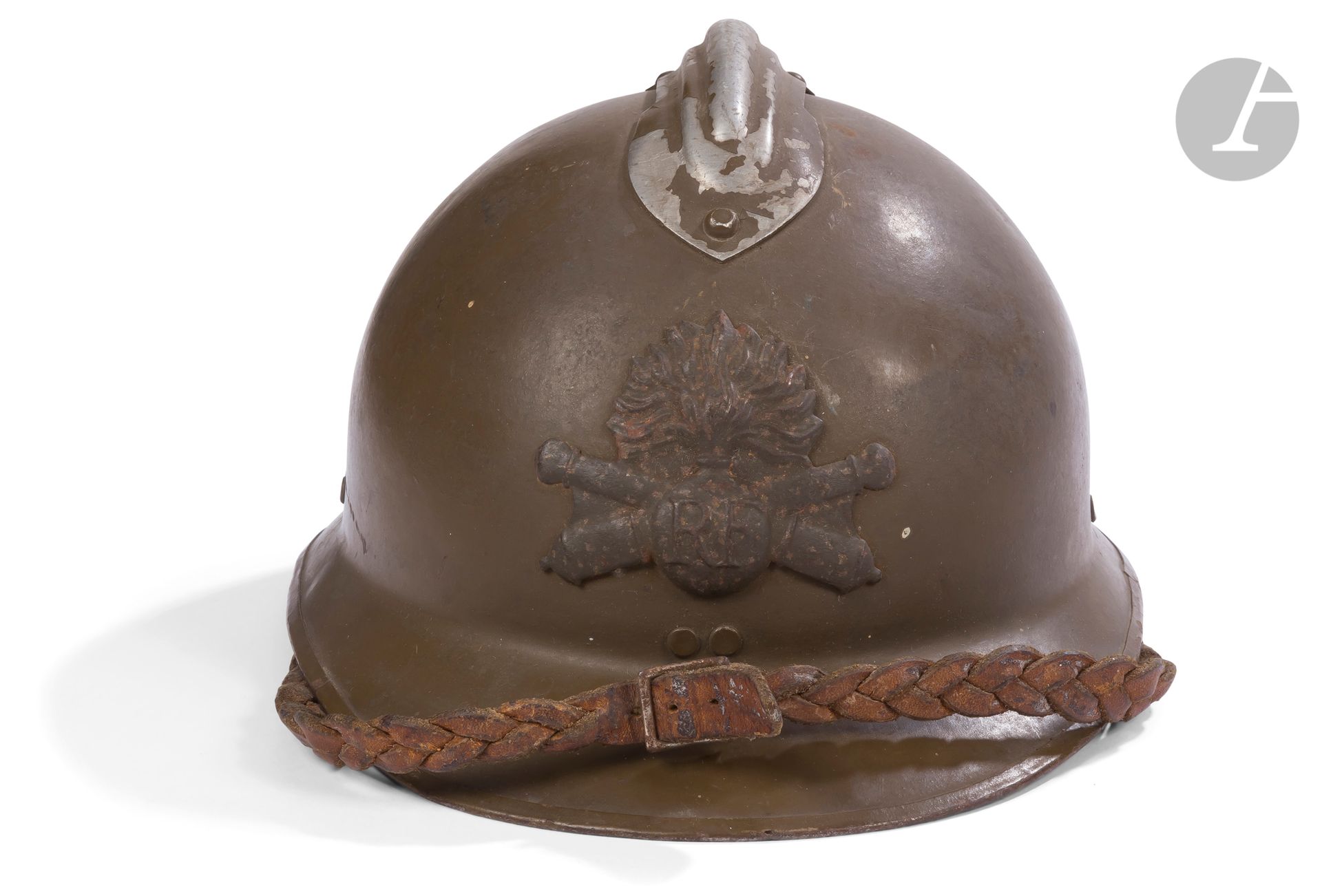 Null Adrian helmet model 26. 
Khaki. Mounted with an artillery badge. 
Patent le&hellip;