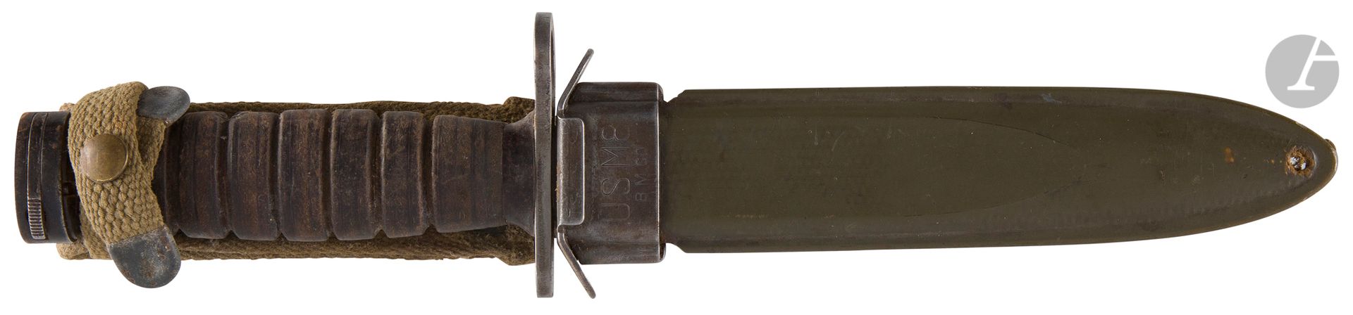Null USA 
Poignard baïonnette M4. 
Poignée à rondelles de cuir. Monture en en ac&hellip;