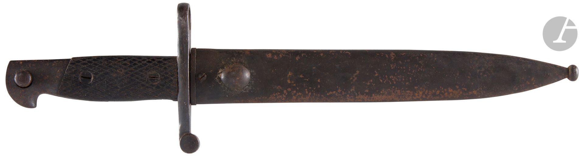 Null 西班牙
1941年款刺刀 "波洛"。
手柄上有方形的木板。铁架子。刀片上盖有印章。古铜色铁片的刀鞘。
刀片长度：24.5厘米 - 总长度：37厘米。
&hellip;