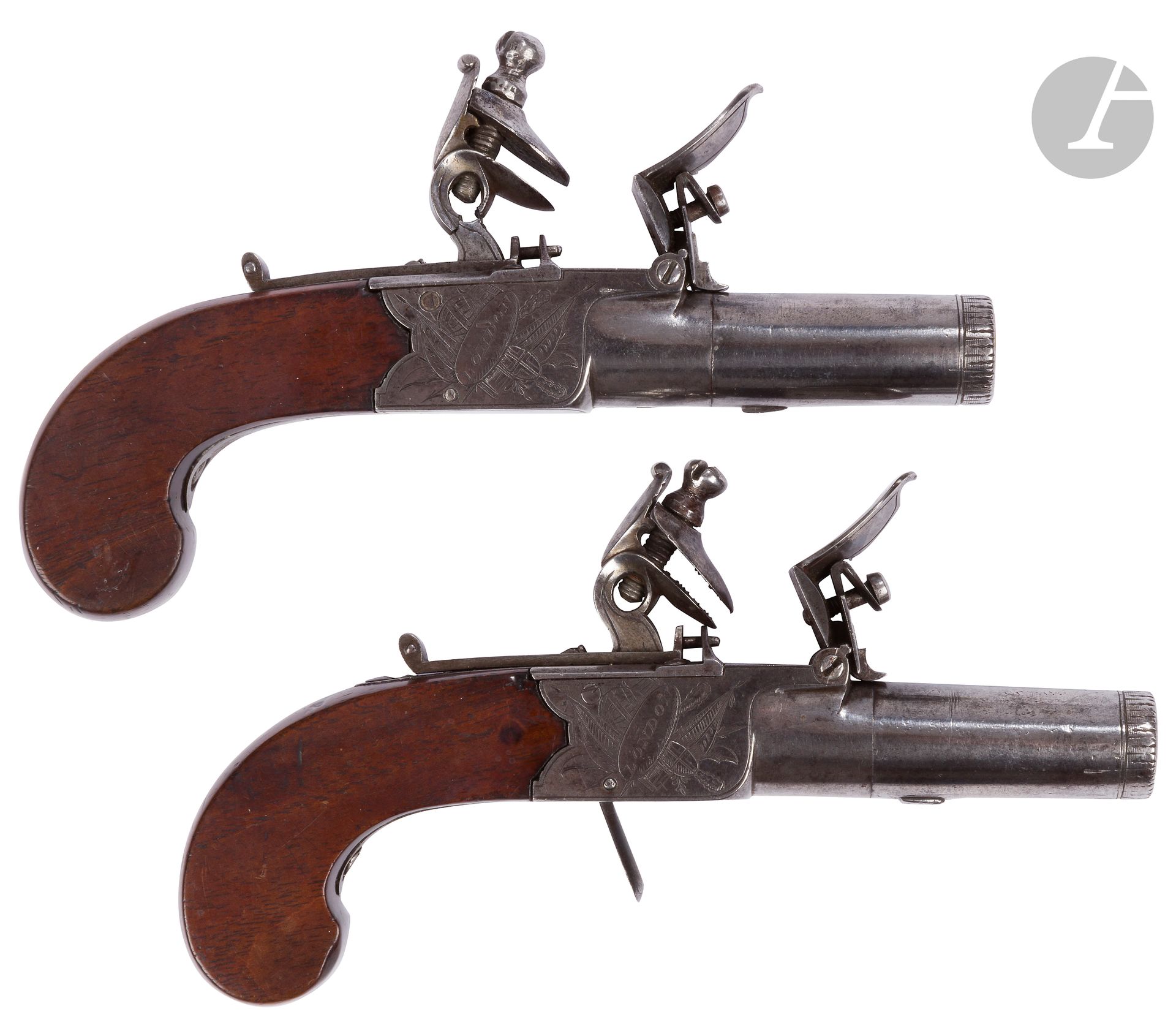 Null 一对燧发枪盒式手枪
圆形枪管，带强迫性子弹。刻有 "W.琼斯-伦敦"。凹陷的触发器。胡桃木枪托，平颊。
公元前约1800年（其中一个锤子完整，但已破碎&hellip;