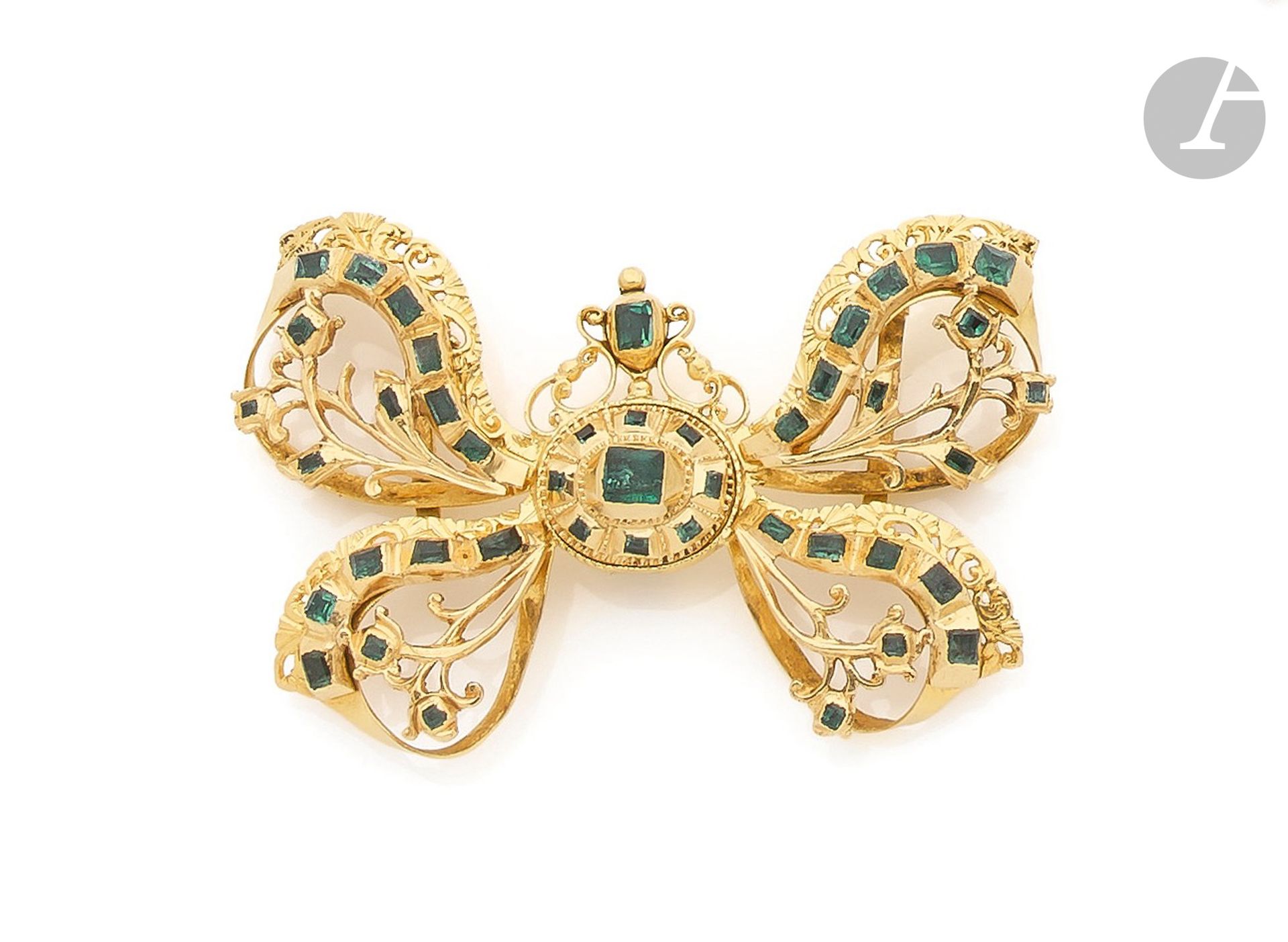 Null Fascia in oro 18 carati (750) che disegna un nastro annodato con smeraldi q&hellip;