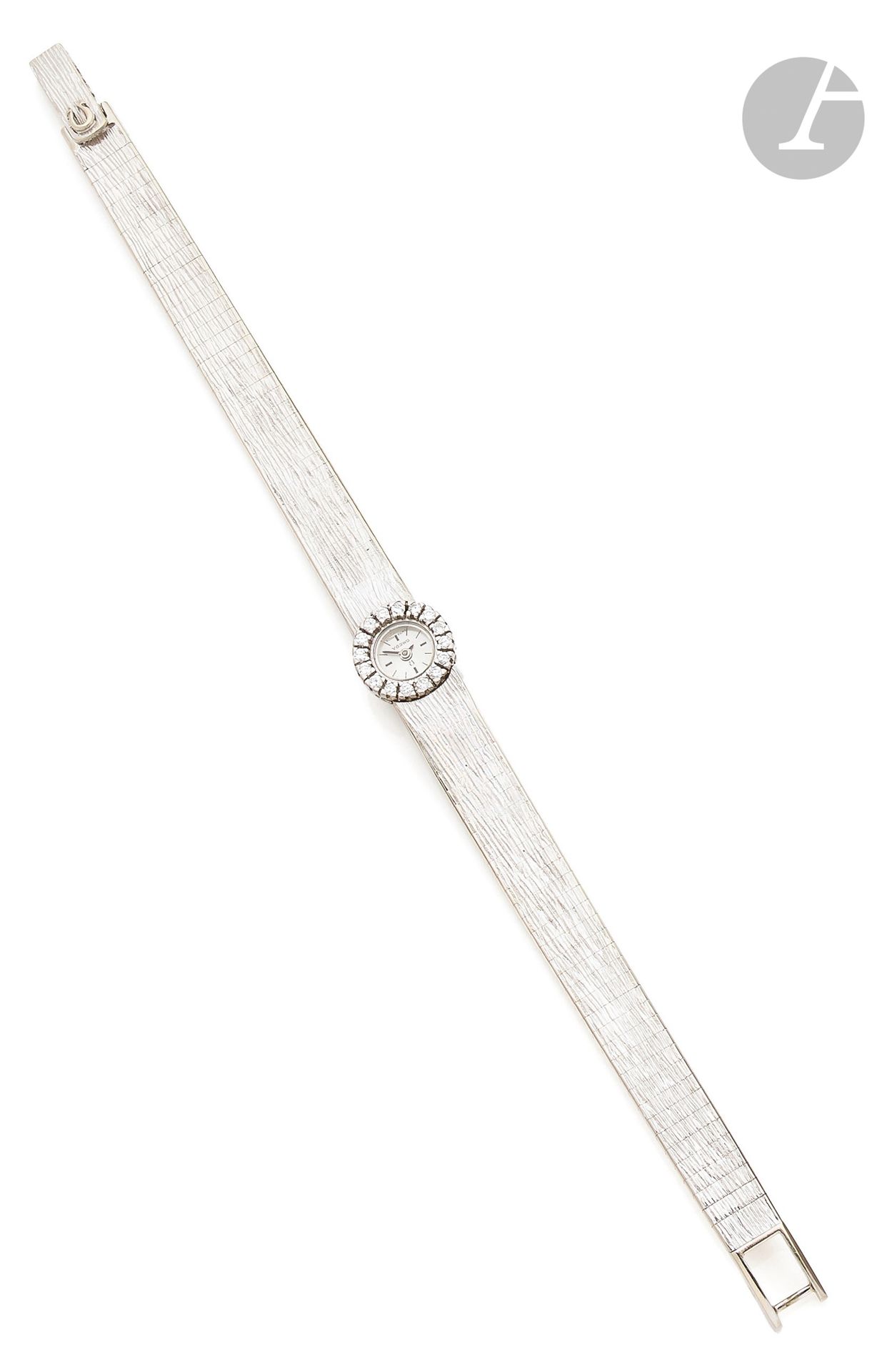 Null 欧米茄
杜普兰
1940s
18K（750）白金镶钻女士腕表。表壳：长方形，背面有上链装置。圆形表圈镶有钻石。表盘：银色，绘有刻度。机芯：长方形，双平&hellip;