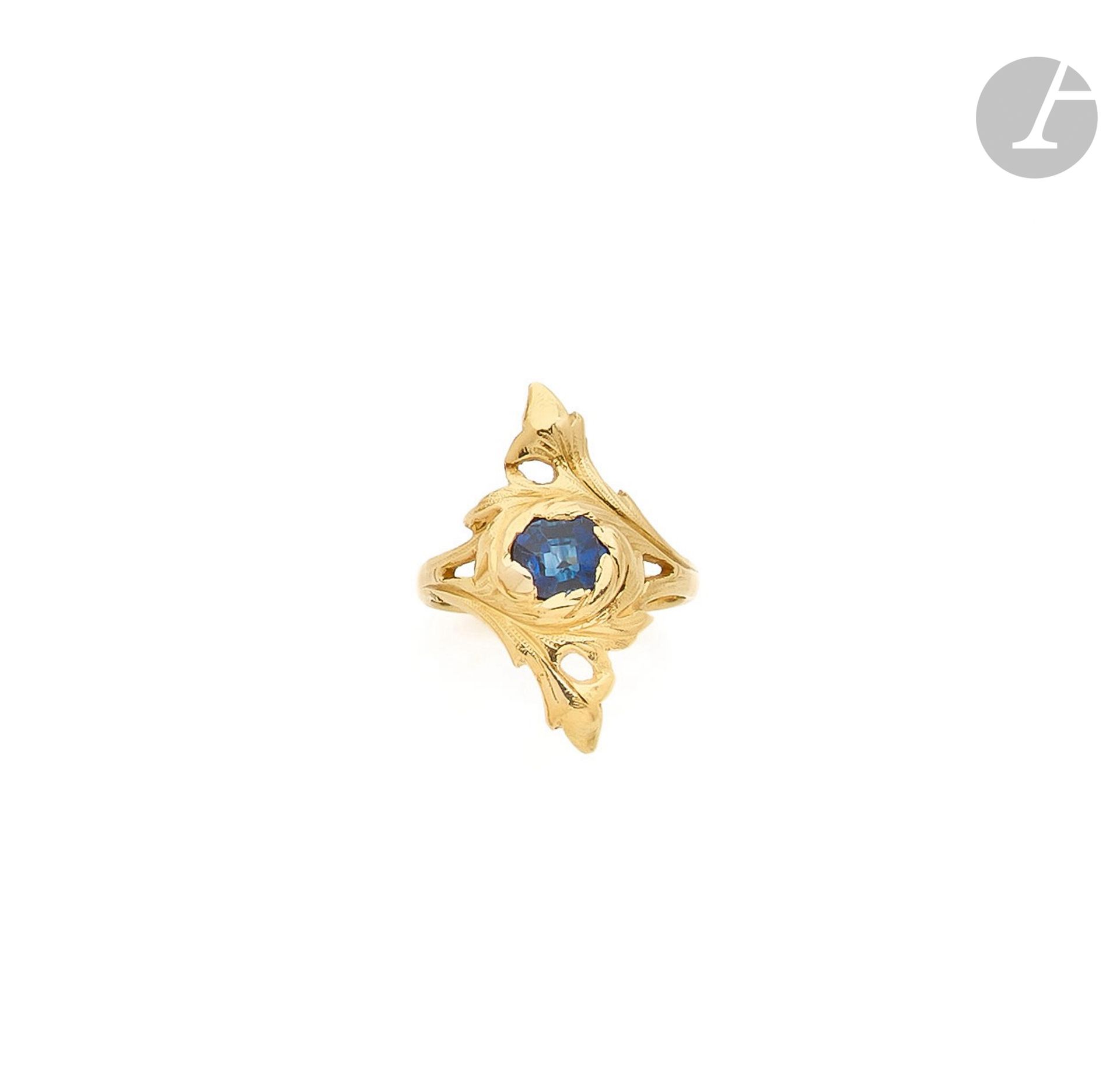 Null Gold ring 18K (750) drawing foliage set with a sapphire. French work of the&hellip;