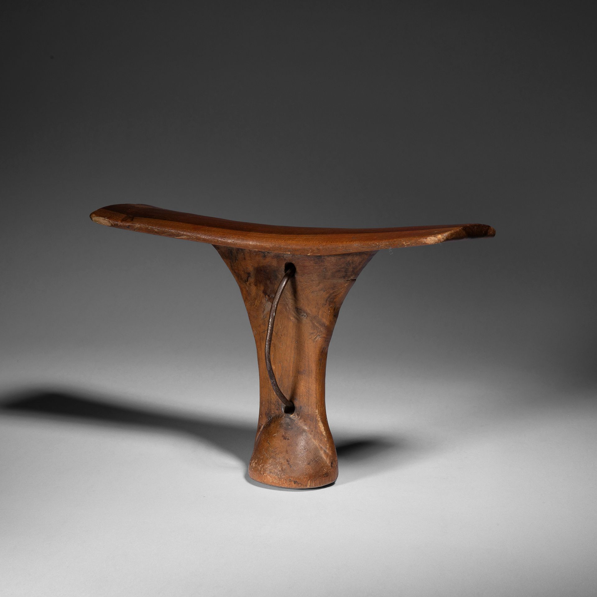 Null A man's stool neck rest. 

Karamajong or Turkana, Ethiopia or Kenya

Wood, &hellip;