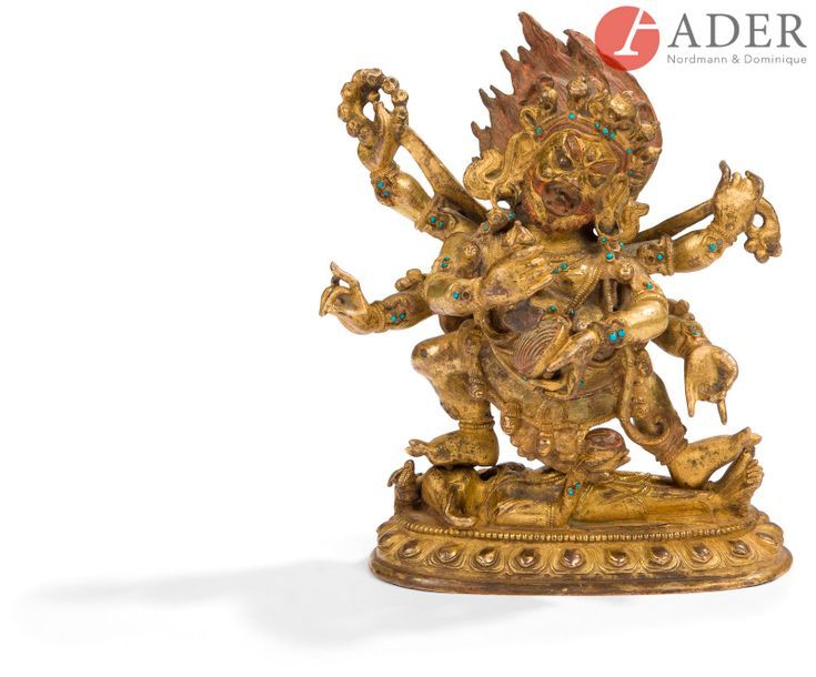 Null TIBET - XIXe siècle
Statuette en bronze doré de Mahakala à six bras debout &hellip;
