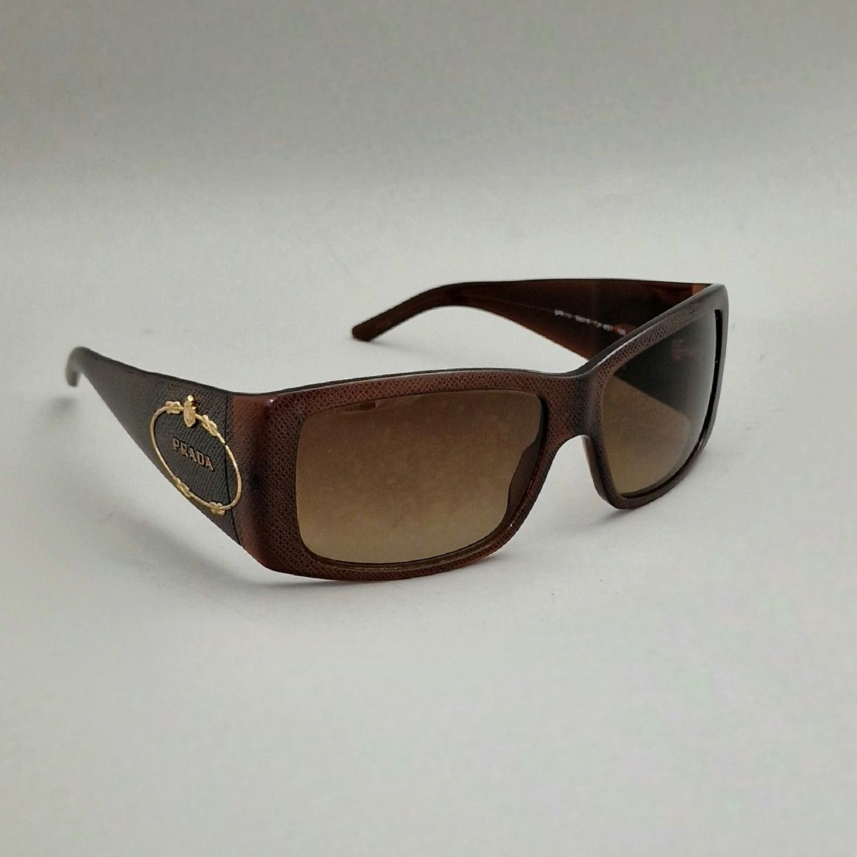 Null PRADA Italy - Pair of sunglasses in tortoiseshell composition and gilded me&hellip;