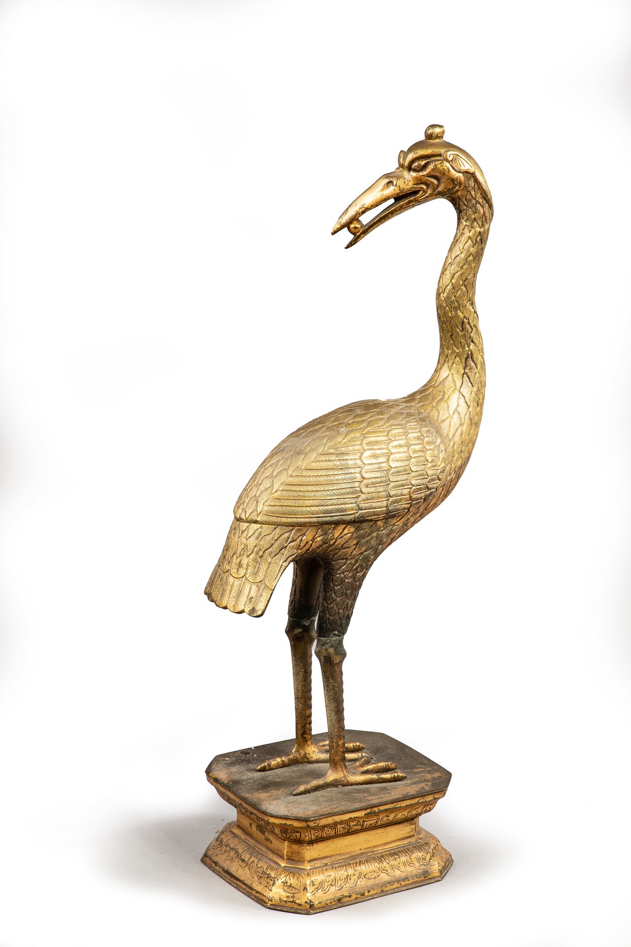 Null 
A gilt bronze standing heron on a pedestal.

China, early 20th century

H.&hellip;