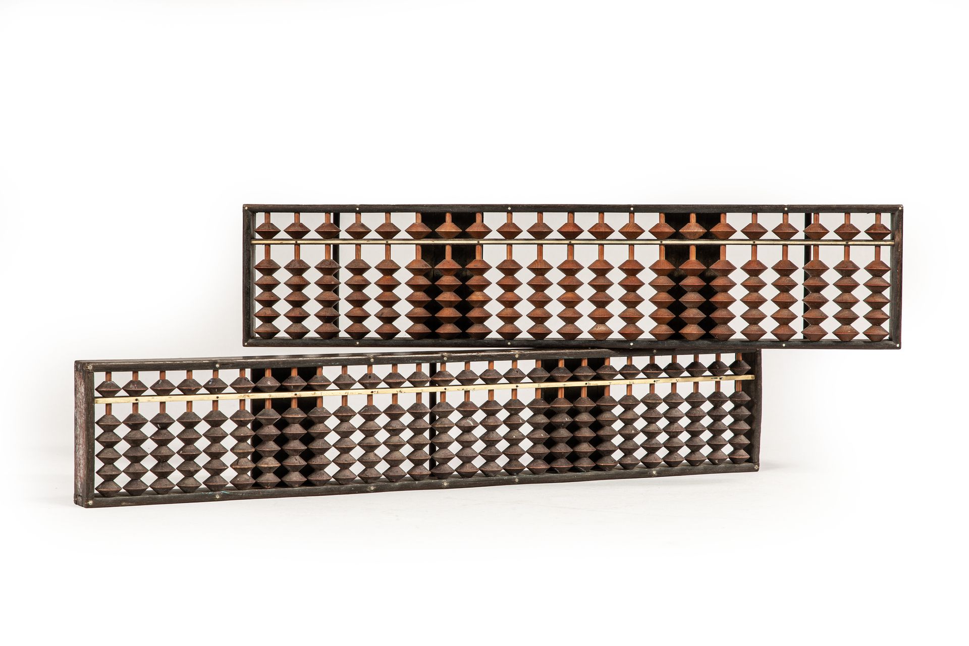 Null 
Two wooden abacus.

Japan 20th century

33 x 7 cm and 36 x 7 cm