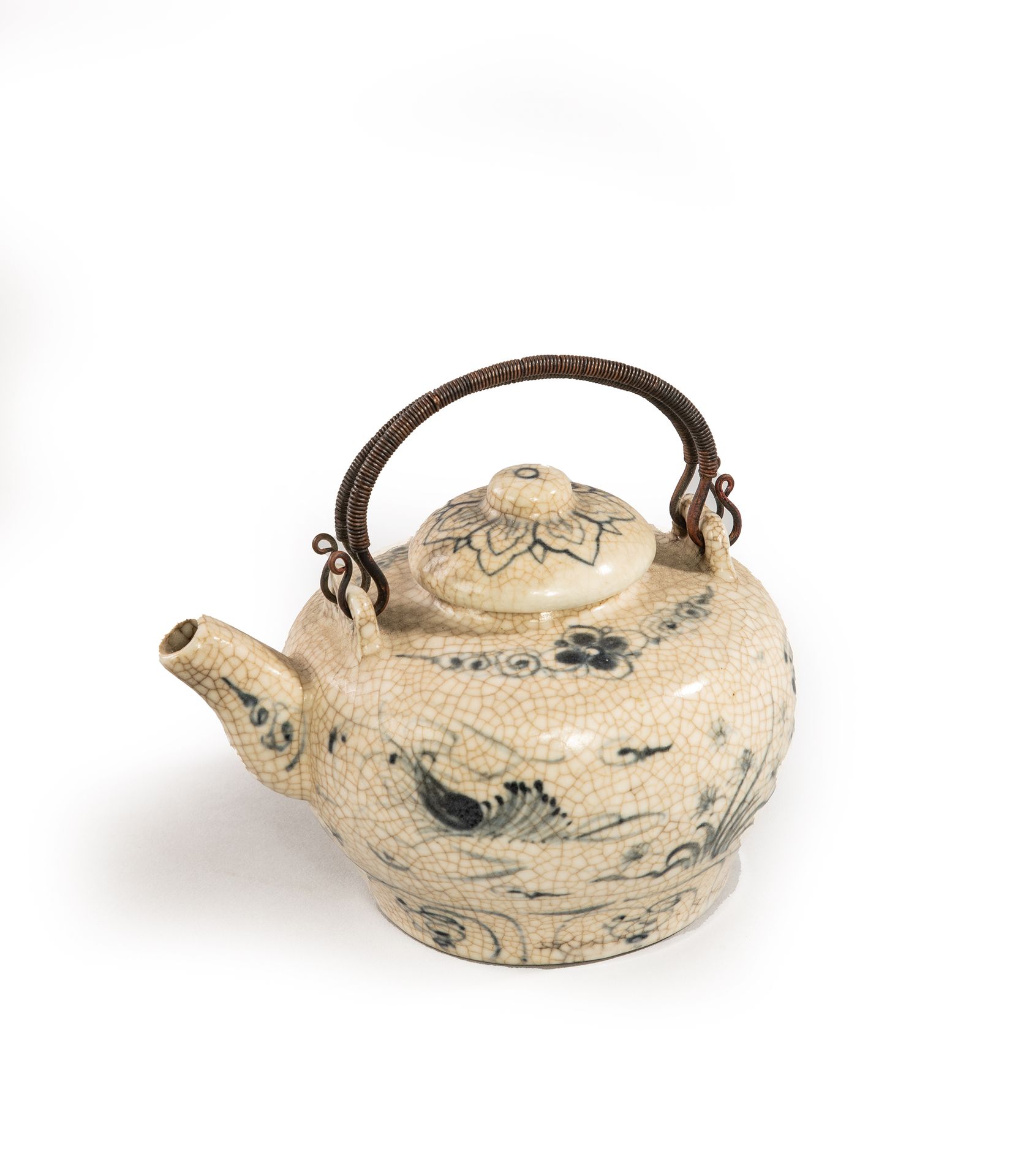 Null 
青白瓷茶壶。

20世纪初的越南

高9厘米，宽11厘米