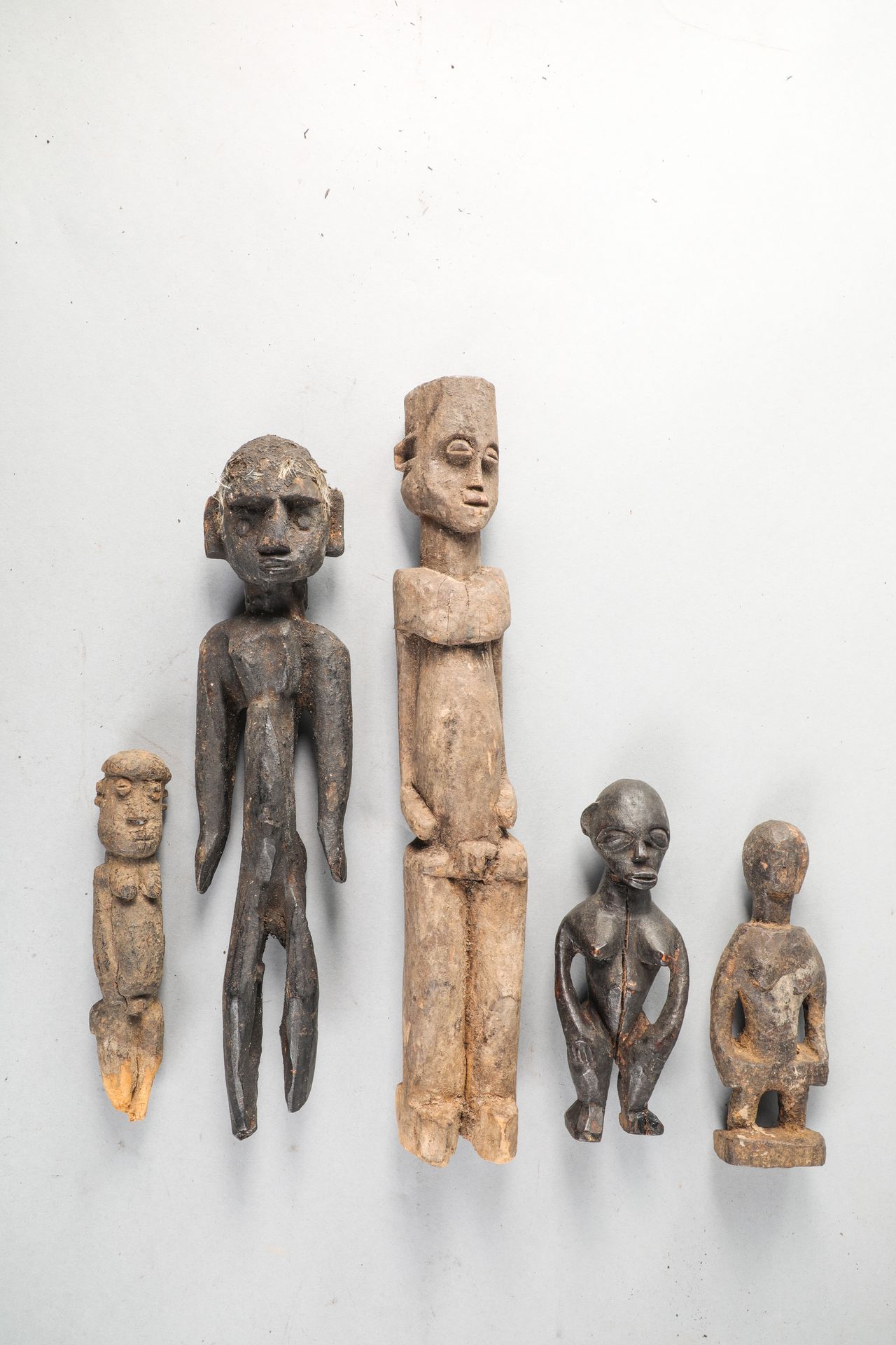 Null Set of 5 Baule and Lobi statuettes, Ivory Coast and Burkina Faso. Wood with&hellip;