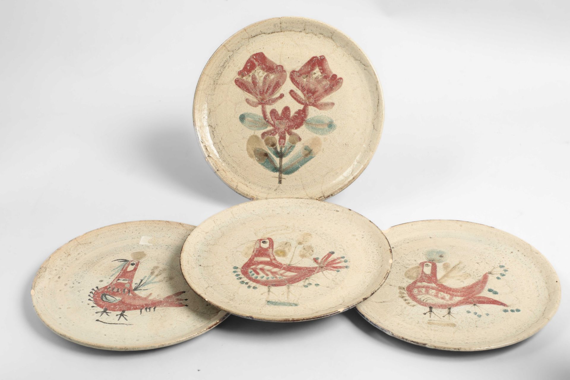 Null 
古斯塔夫-雷瑙（Gustave RAYNAUD） (1915-1972)




勒穆里尔工作室




有鸟类或花卉装饰的四件套盘，底座下有字母图&hellip;