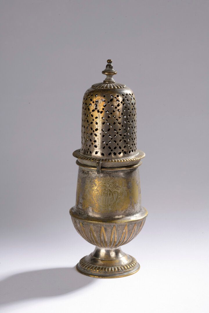 Null A baluster-shaped metal sprinkler decorated with lanceolate leaves and a co&hellip;