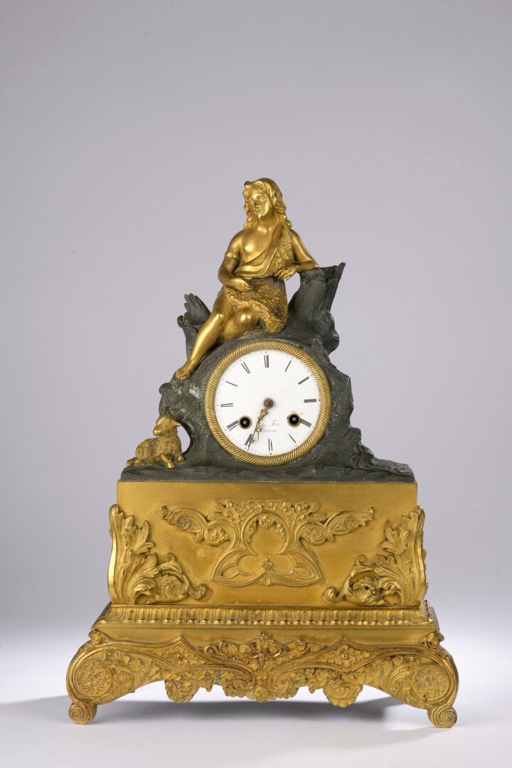 Null Saint John the Baptist child. Clock with figure in bronze with two green an&hellip;