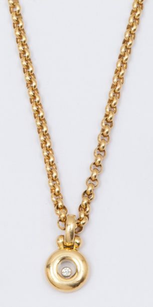 CHOPARD «?Happy Diamond?» - Chaine et pendentif en or jaune, ornée d’un diamant taillé...