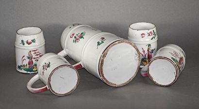 null Five mugs and a earthenware jug with polychrome decoration of Chinese and flowers....