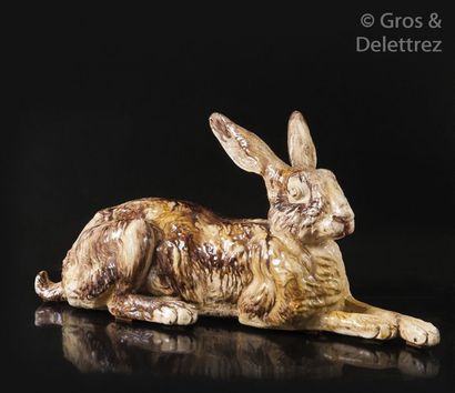 Large hare in brown enamelled glazed clay....