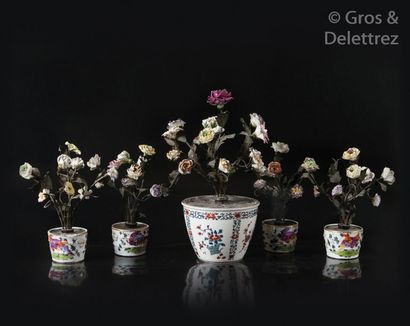null Samson Five cylindrical porcelain pots decorated with porcelain flowers with...
