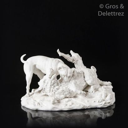 SÈVRES Group in soft porcelain biscuit representing a dog attacking a boar after...