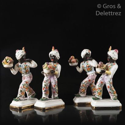 Four earthenware statuettes representing...