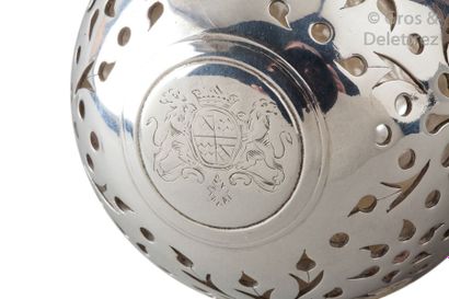 null Sponge ball in openwork silver resting on a contoured pedestal, the lid engraved...