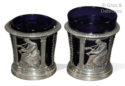 Pair of openwork silver salerons with repelled...
