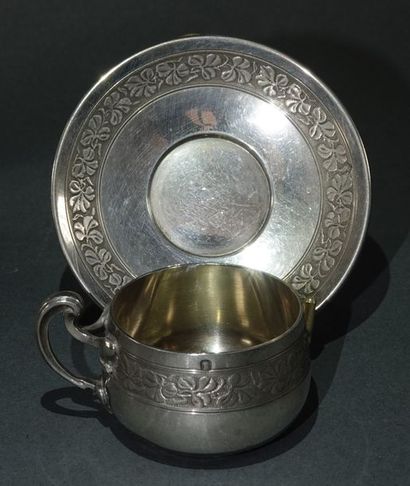 null Pair of coffee cups and a mocha cup with their saucers, in silver with carved...