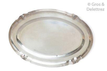 Oval silver dish with contoured net edges...