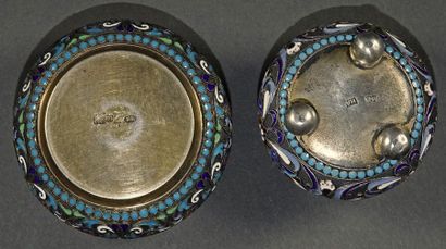null Two silver, vermeil and polychrome red, blue and white enamels salerons decorated...