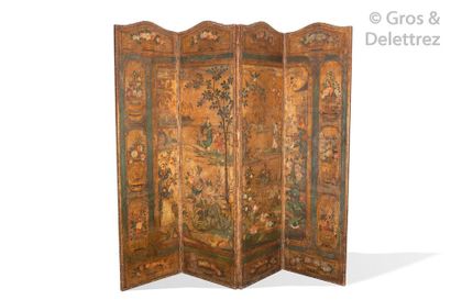 null Four-leaf leather folding screen with polychrome Chinese scenes on a gold background....