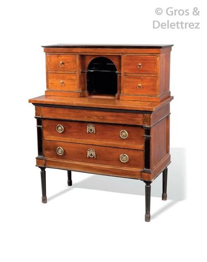 null A mahogany, mahogany veneer and blackened wood secretary's chest of drawers...