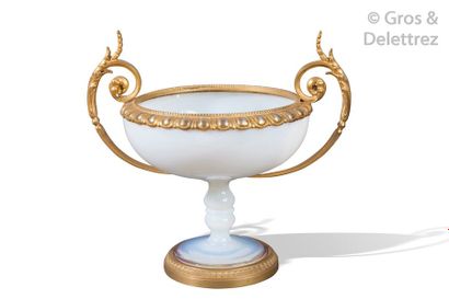 null Large base cup in soapy opaline, the frame in chased and gilded bronze decorated...