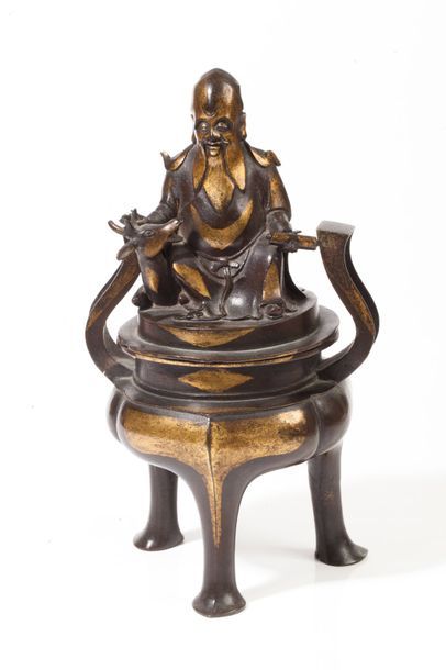  Chine, XVIIIe siècle 
Brûle-parfum tripode à contour polylobé en bronze, le couvercle...