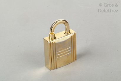HERMES PARFUMS Vaporisateur cadenas en métal doré. Hauteur?: 8cm.