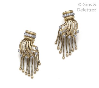 Pair of yellow gold earrings, adorned with...