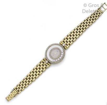 CHOPARD «?Happy Diamonds?» - Bracelet-montre de dame en or jaune, boîtier ovale,...