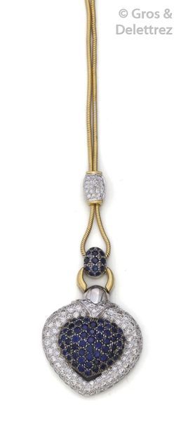 null Yellow gold necklace tie, adorned with a heart motif paved with sapphires in...