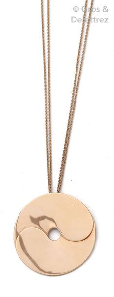 DINH VAN " Pi " - Double yellow gold chain, adorned with a circular pendant. Signed...