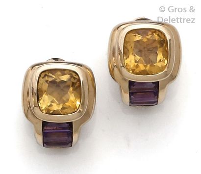 null Pair of yellow gold earrings, each adorned with a citrine and calibrated amethysts....