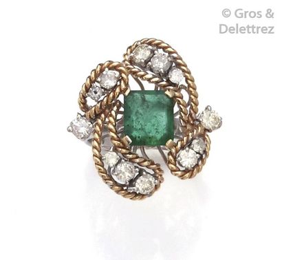 null Ring " Fleur " in 14K white and yellow gold, adorned with a rectangular emerald...