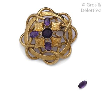 null Brooch " Rosace " in openwork yellow gold, decorated with engraved interlacing...