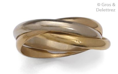 CARTIER Ring " Trinity " in gold of three intertwined colors. Signed Cartier. Tour...