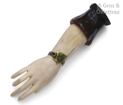 null Seal in amber and ivory carved with decoration of a hand carrying an enamelled...