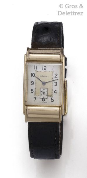 MOVADO Yellow gold wrist watch, rectangular case, two-tone dial, Arabic numeral indexes,...