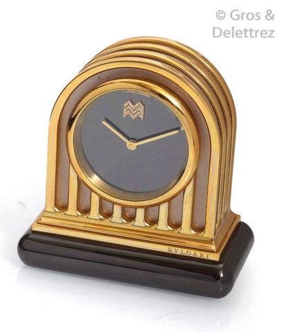 BULGARI " Duomo " - Clock in gold and silver plated metal with a base in blackened...